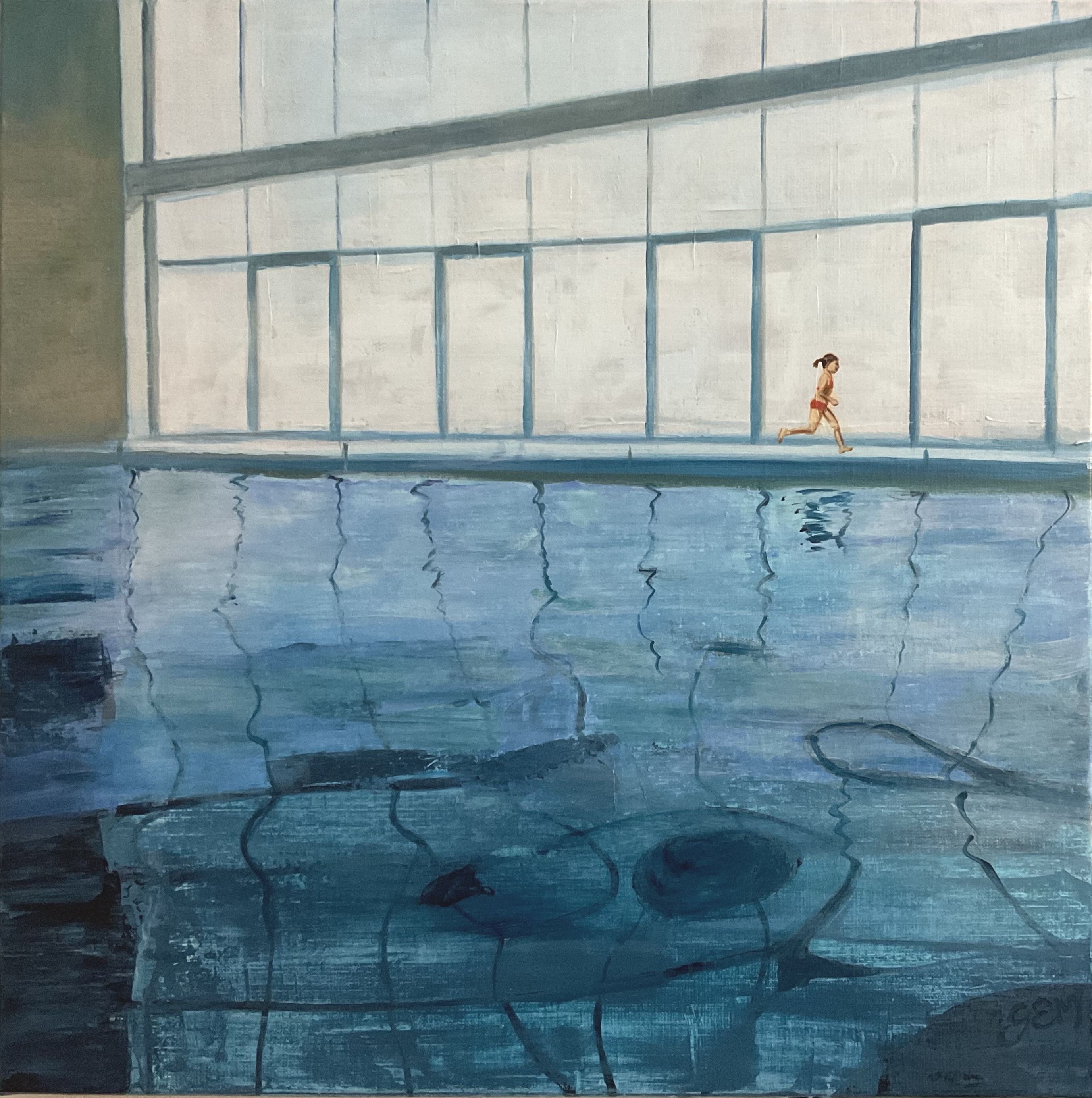 Little girl running on the edge of the pool